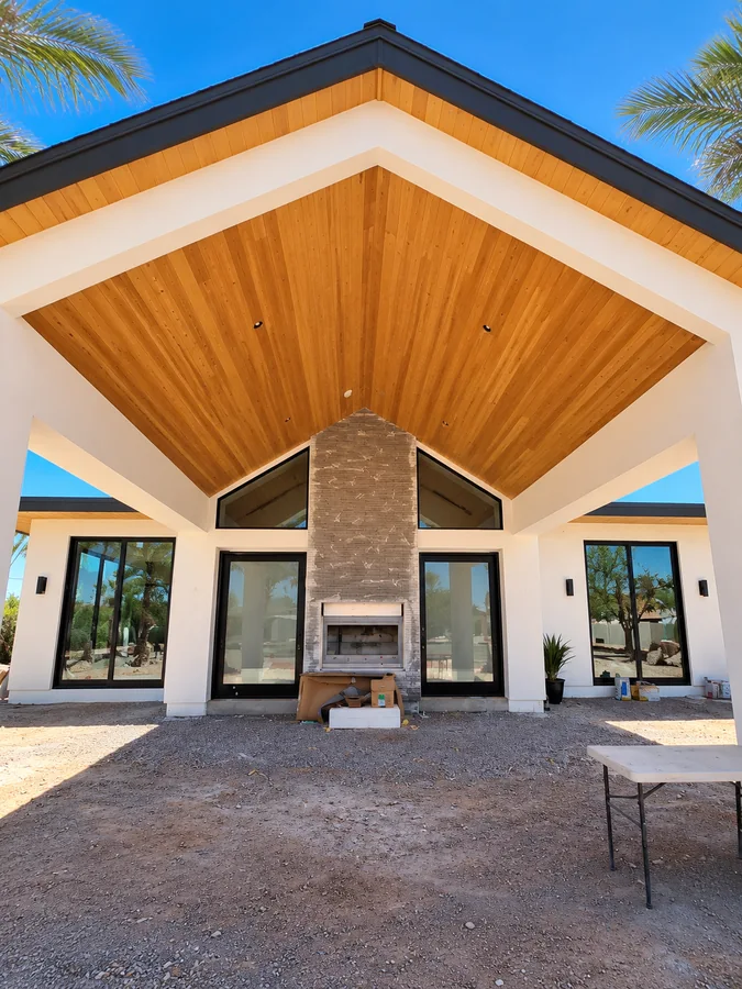 Casita & Guest House: Covered outdoor area with vaulted wood roof and central fireplace