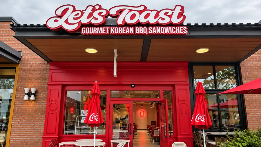 Let’s Toast Restaurant: Let’s Toast exterior with readable project sign and red entrance; sign tagline Gourmet Korean BBQ Sandwiches