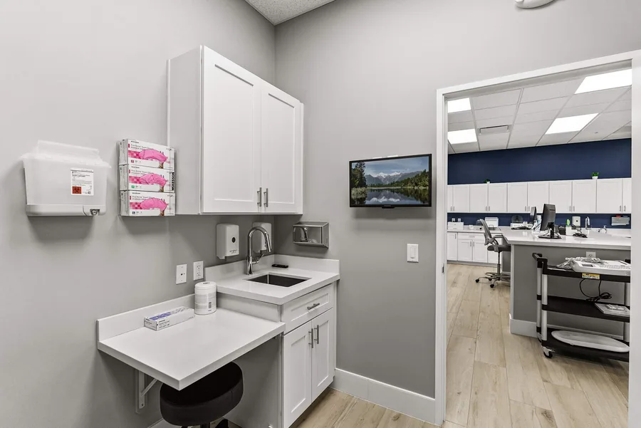 MY DR NOW: Clinical sink and storage alcove at the MY DR NOW medical office