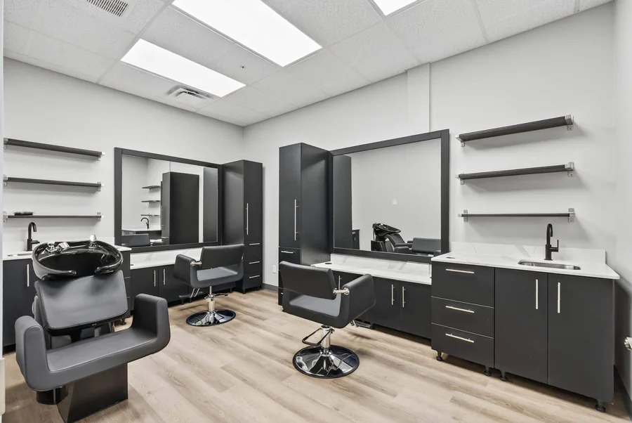 Wild Souls Salon Suites: Finished salon suite at Wild Souls with cabinetry, mirrors and styling chairs